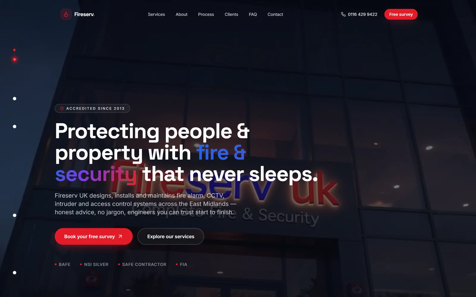 Fireserv UK homepage: the headline “Protecting people & property with fire & security that never sleeps.” over a night photograph of the Fireserv UK building.